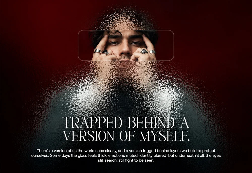 Man peering through fogged glass on a dark red "Trapped behind a version of myself" poster